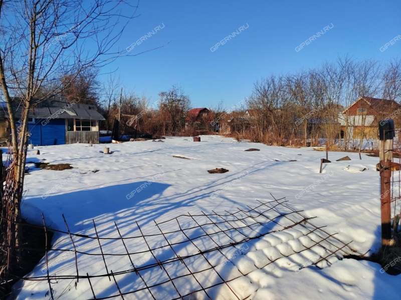 земельный участок 5,6 сотки Комсомольская улица